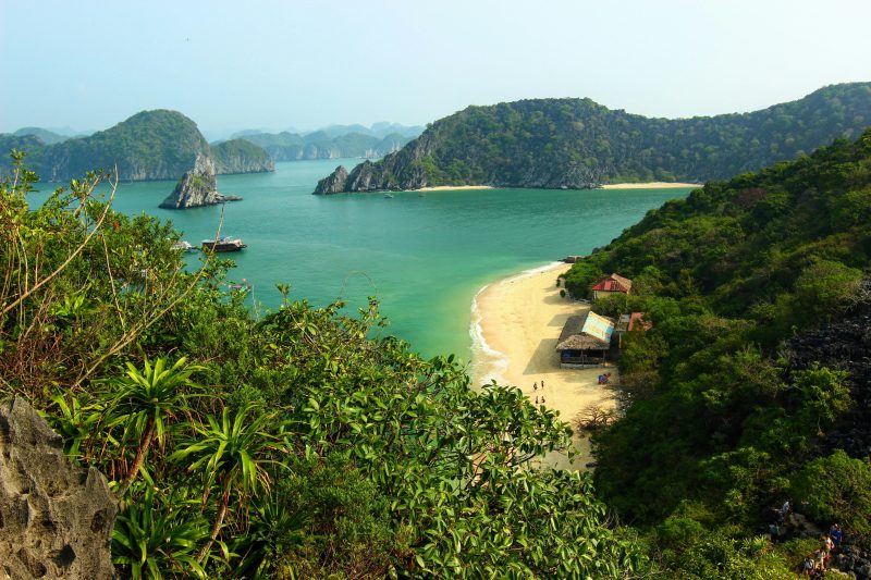 Aerial view of Halong Bay limestone cliffs in Vietnam with turquoise water